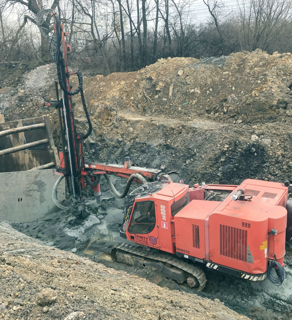 Claymont-Properties Large drilling equipment onsite digging into ground