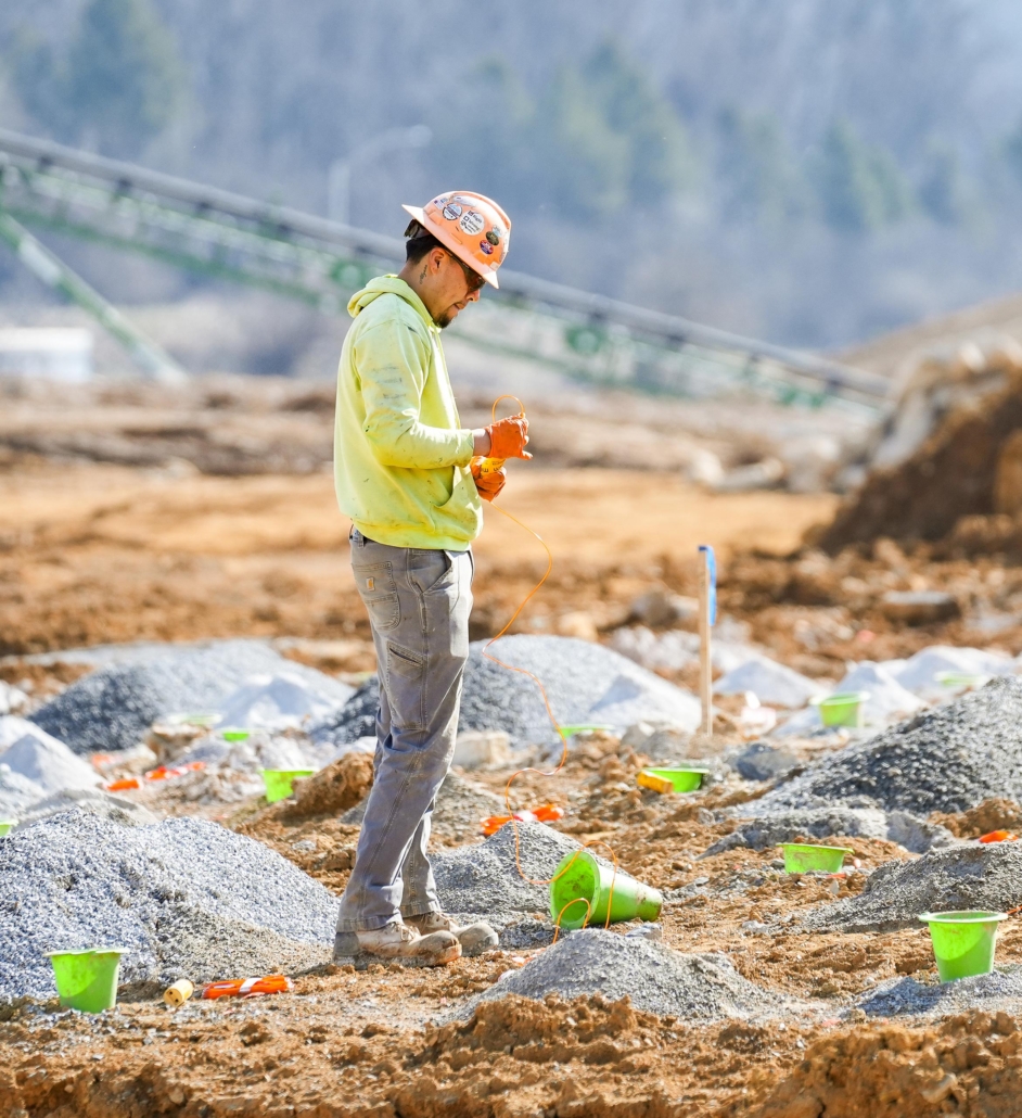 trinity_7 Trinity worker preparing blast in work zone.