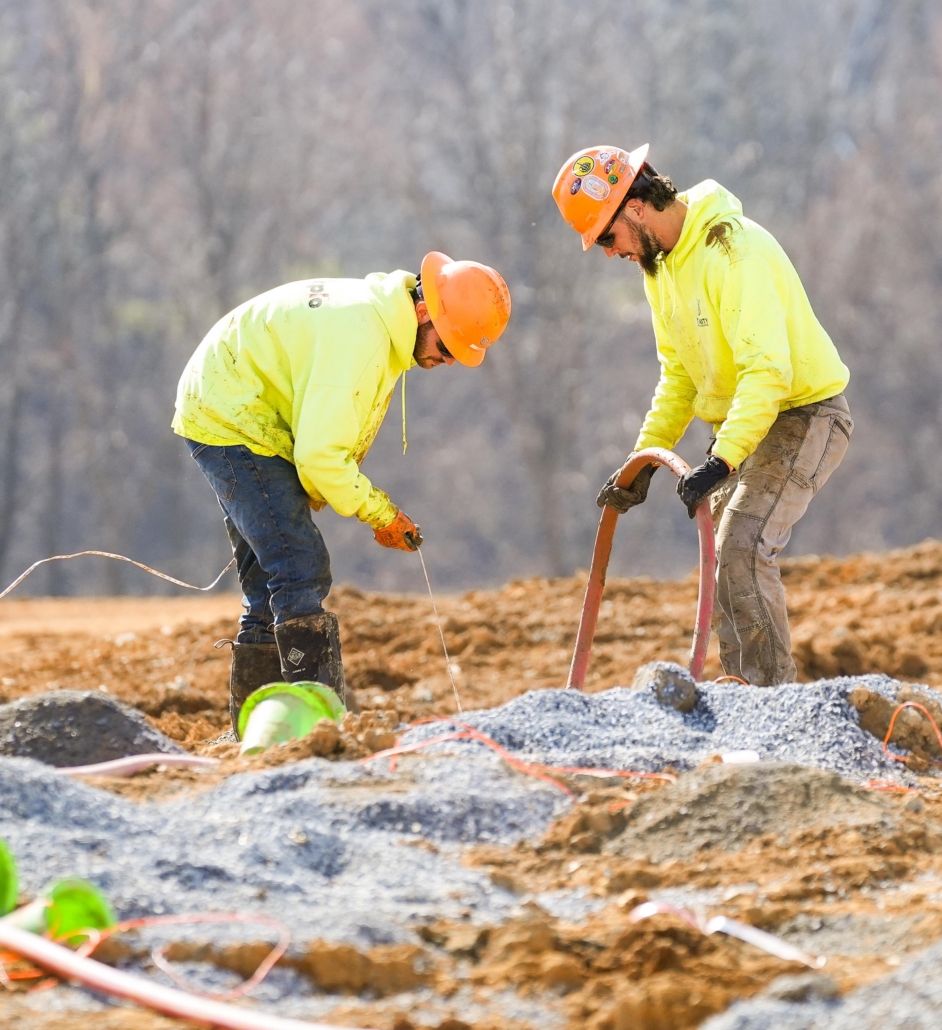 trinity_8 Two Trinity employees working onsite in blasting zone.